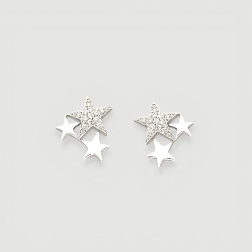 Amara Jewels rhodium-plated sterling silver stud earrings with a cluster of three stars, one paved with small crystals.