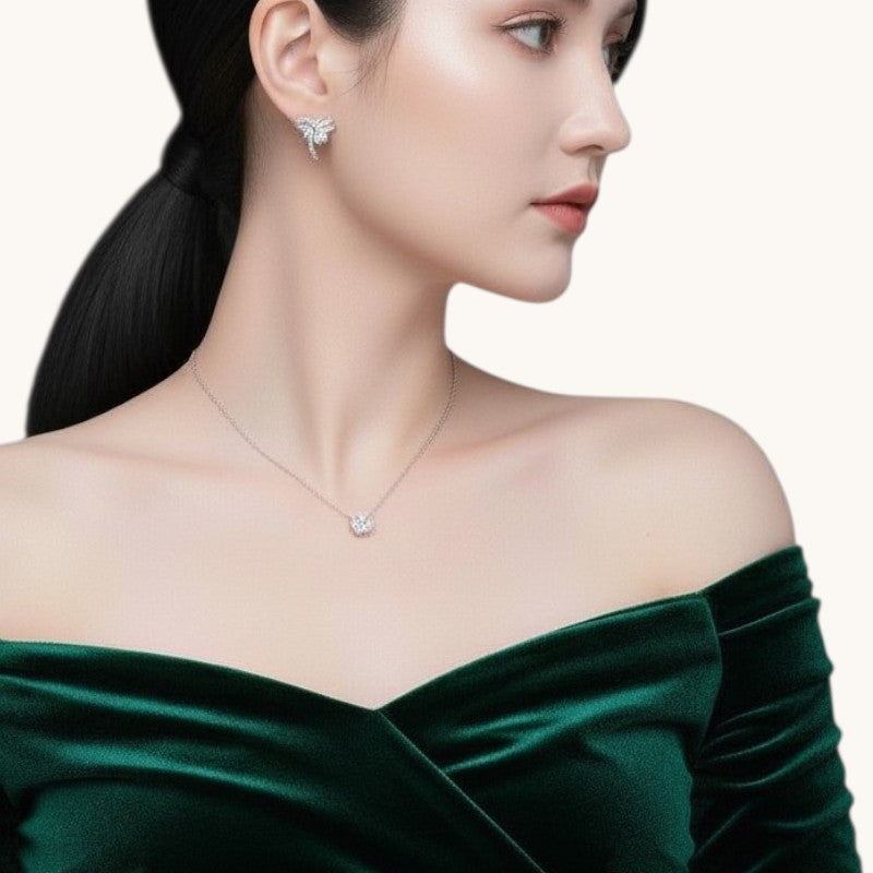 Amara Jewels Sterling Silver Bow Knot Crystal Stud Earrings with shimmering CZ crystals.