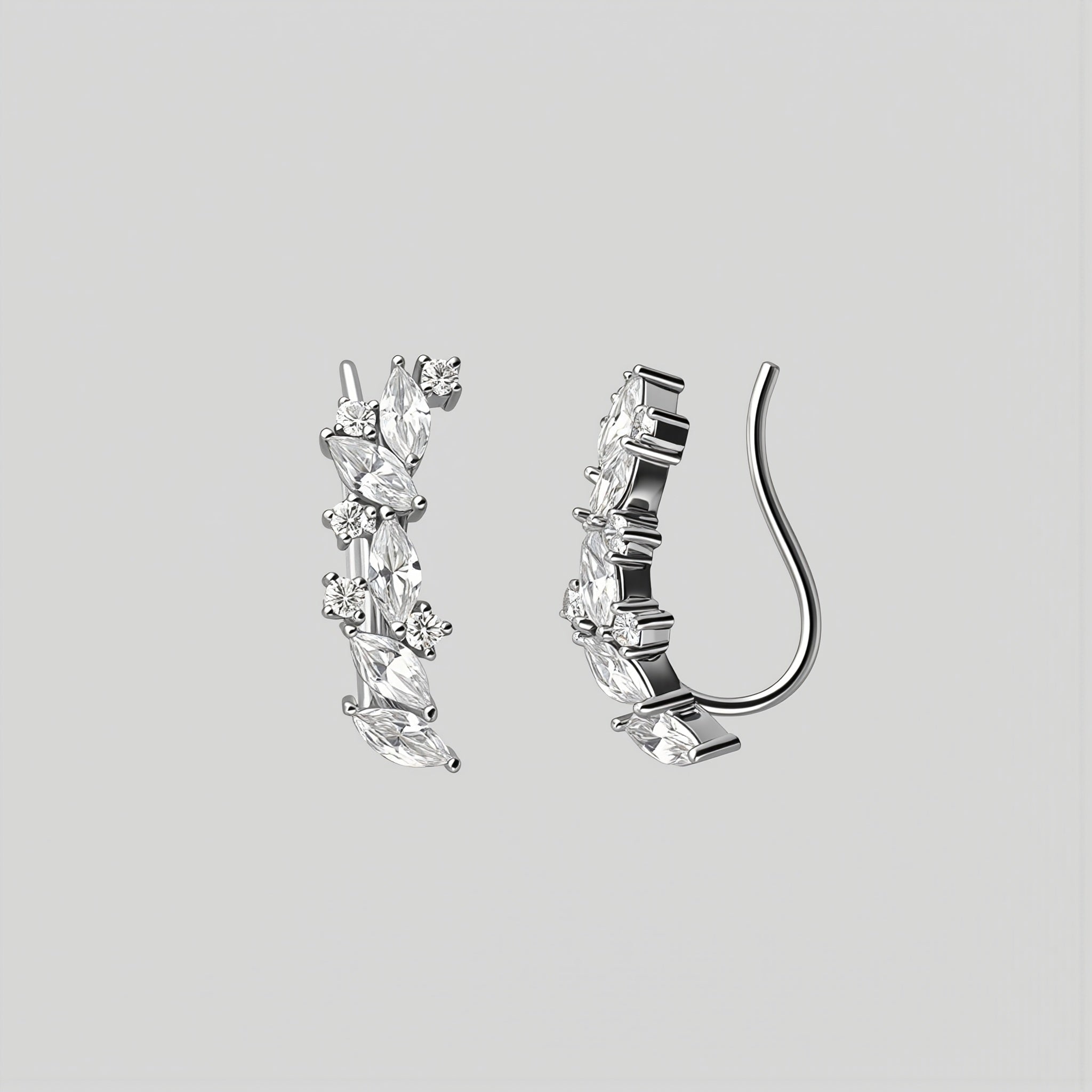 Amara Jewels sterling silver climber earrings with marquise and round cubic zirconia stones.