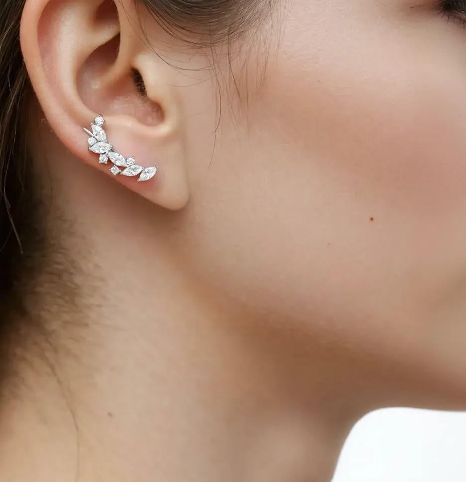 Amara Jewels sterling silver climber earrings with marquise and round cubic zirconia stones.