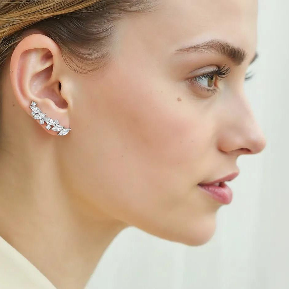 Amara Jewels sterling silver climber earrings with marquise and round cubic zirconia stones.