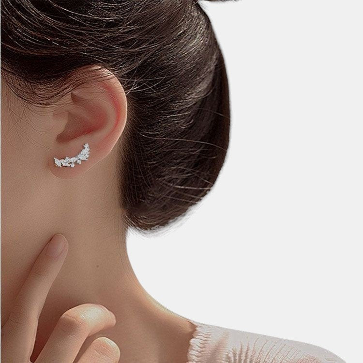 Amara Jewels sterling silver climber earrings with marquise and round cubic zirconia stones.