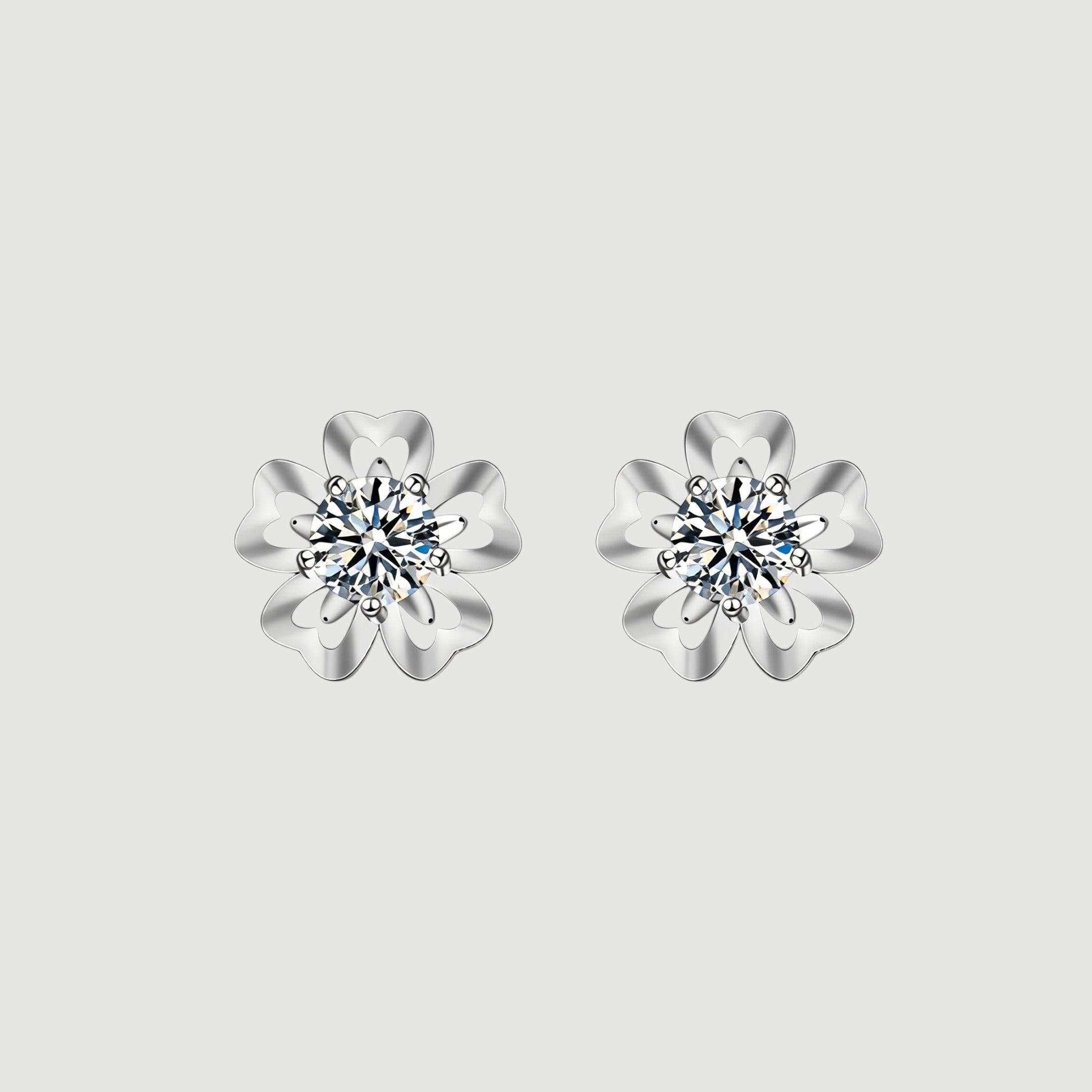 Amara Jewels sterling silver flower petal stud earrings with a central round stone, symbolizing love and elegance.