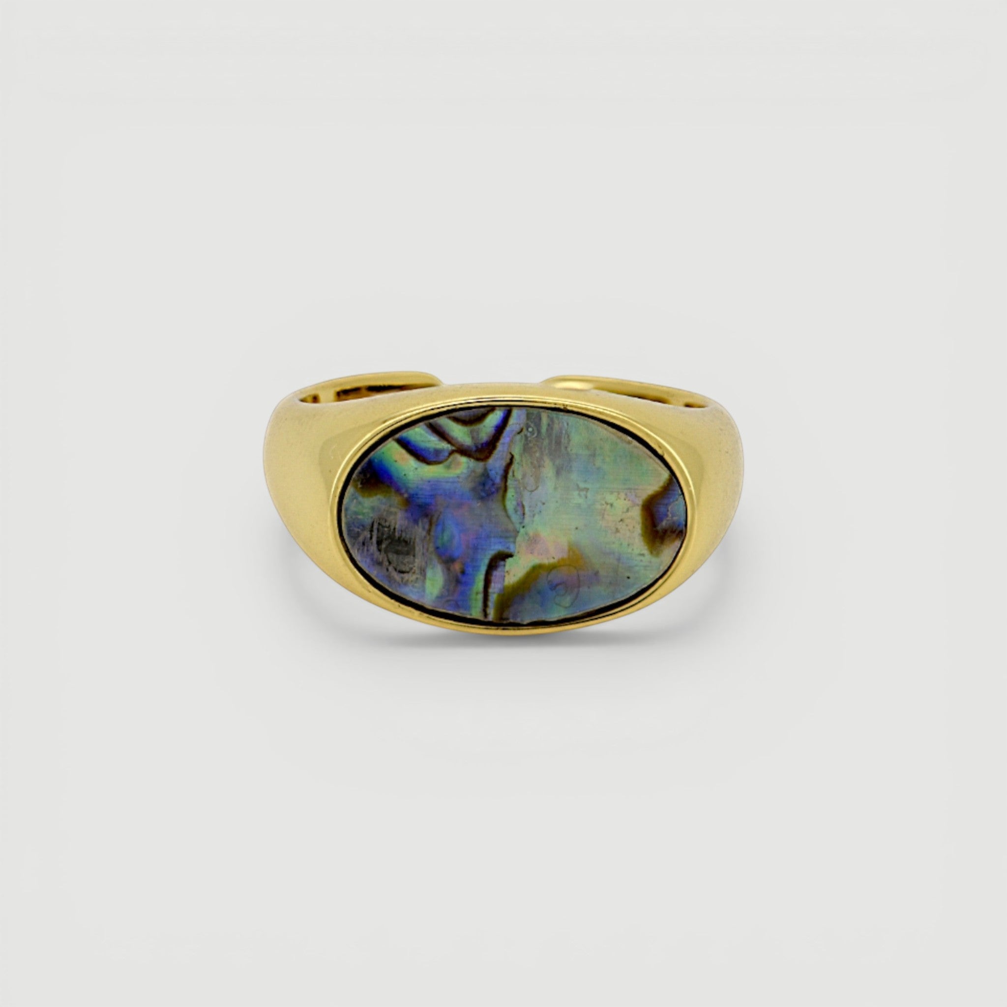 Amara Jewels gold-tone open ring with oval abalone shell inlay featuring iridescent blues, greens, and purples.
