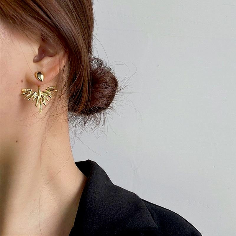 Amara Jewels 18K gold plated sterling silver leaf dangle earrings with sparkling cubic zirconia accents.