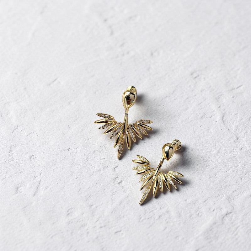 Amara Jewels 18K gold plated sterling silver leaf dangle earrings with sparkling cubic zirconia accents.