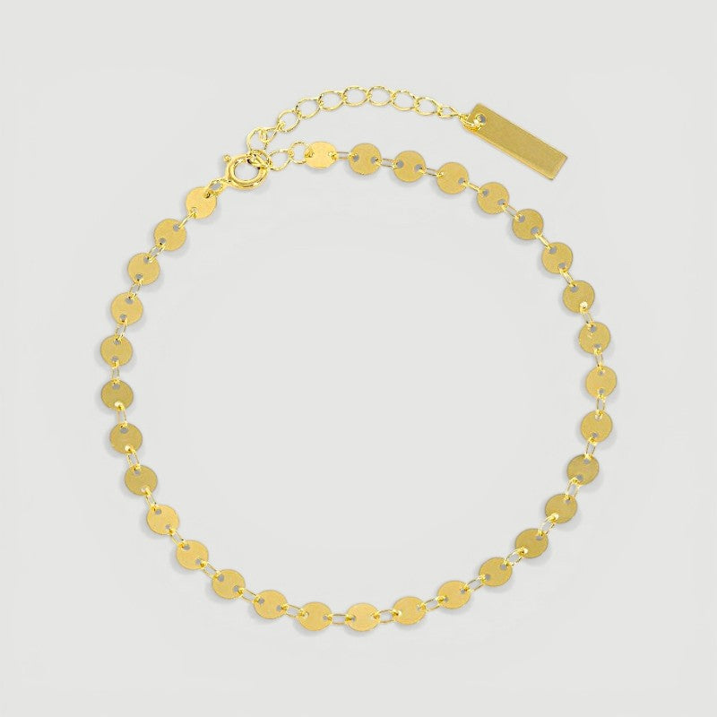 Amara Jewels gold-plated sterling silver bracelet with interlocking polished discs, adjustable chain, and lobster clasp.