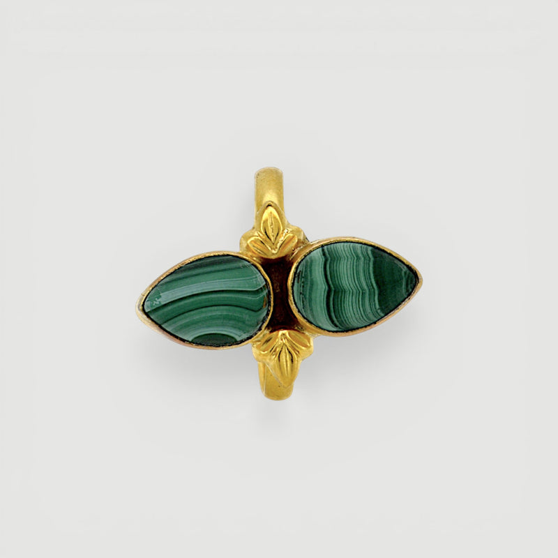 Amara Jewels green malachite statement ring in 18K gold vermeil over sterling silver. Features natural malachite gemstone with unique banding patterns.