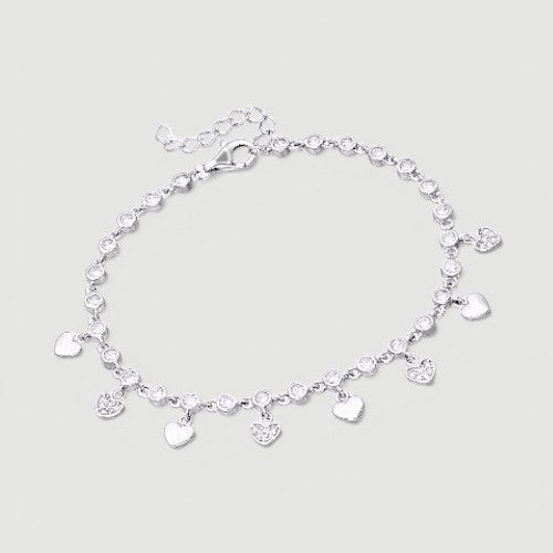 Amara Jewels sterling silver bracelet with cubic zirconia stones and dangling heart charms.