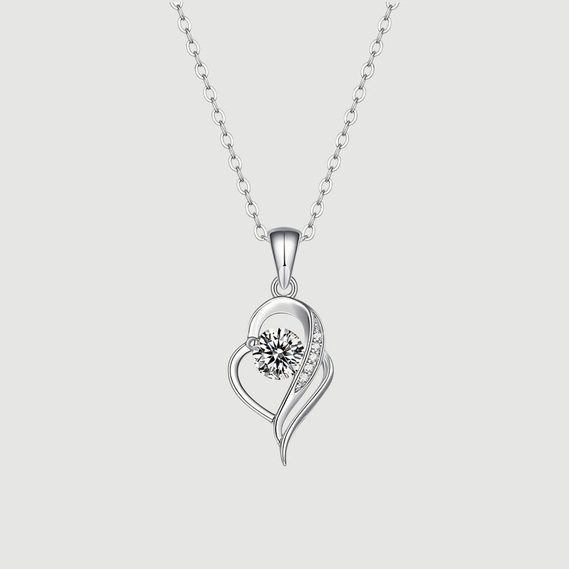 Amara Jewels sterling silver necklace with an irregular heart pendant featuring a cubic zirconia and accent stones.