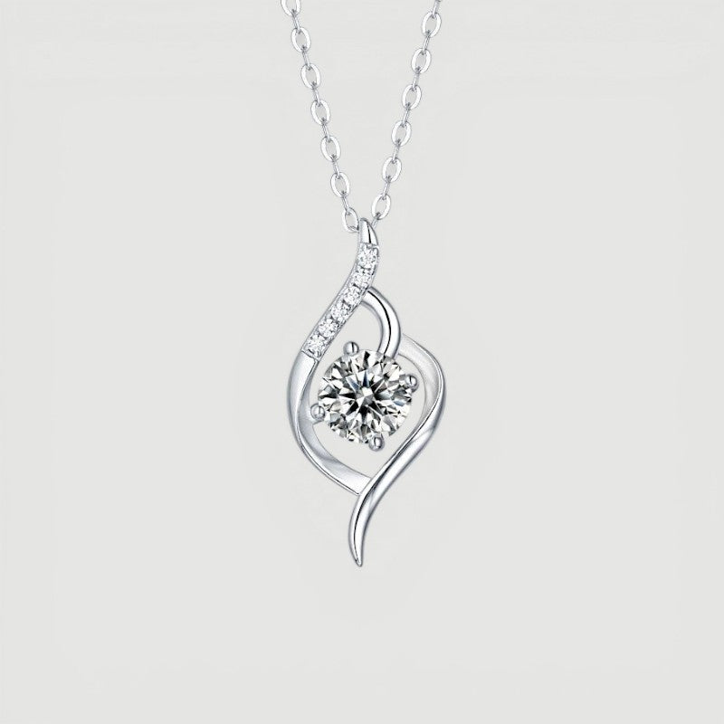 Amara Jewels Sterling Silver Infinity Twirl Pendant Necklace with round-cut crystal and small accent stones.