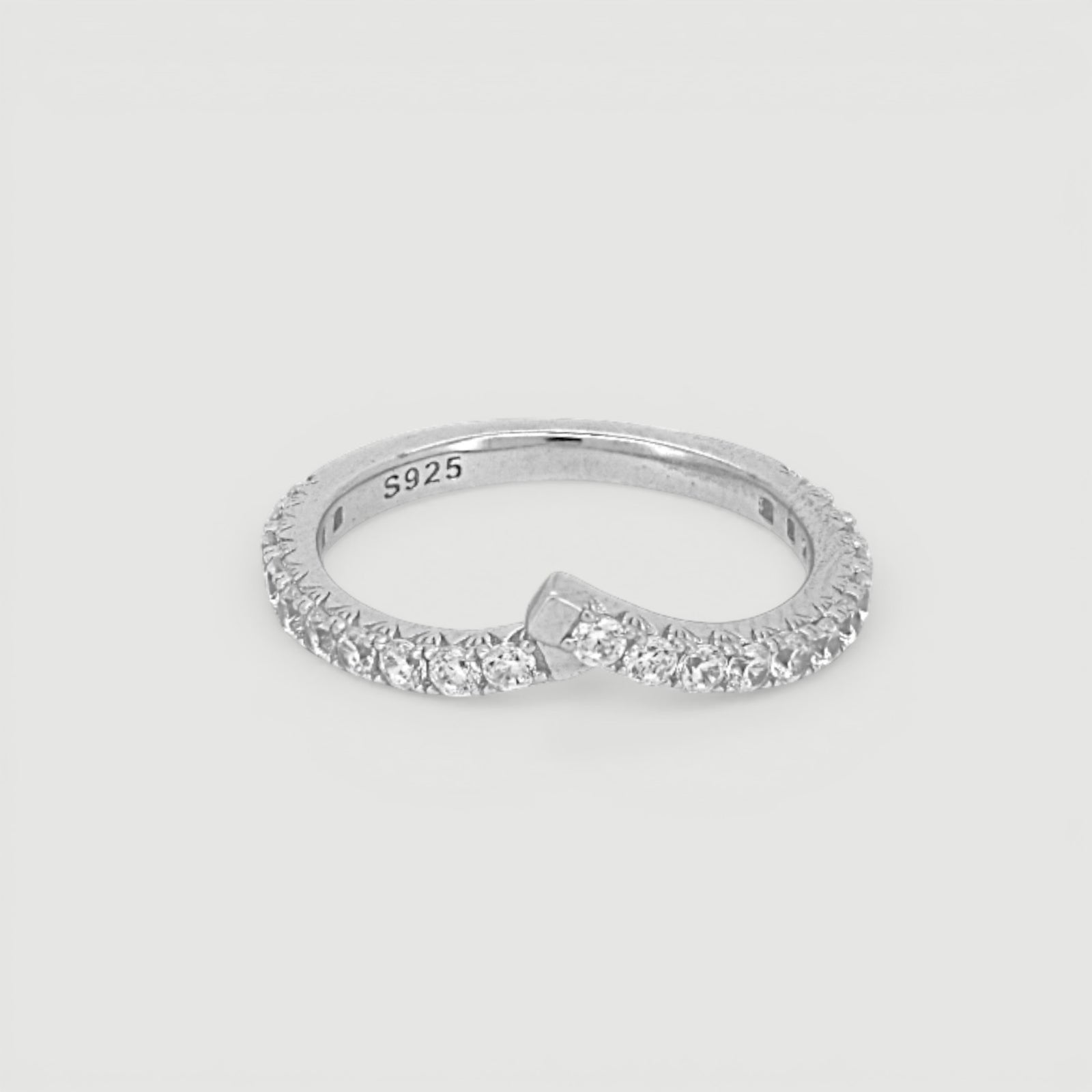 Amara Jewels V-shape ring with pavé-set cubic zirconia stones on a slim sterling silver band.