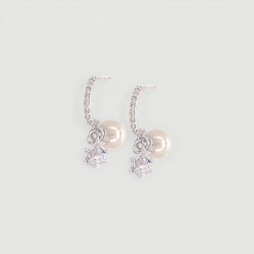 Amara Jewels sterling silver dangle earrings with pearl and crystal snowflake charms.