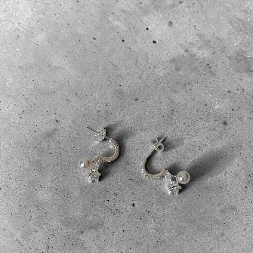 Amara Jewels sterling silver dangle earrings with pearl and crystal snowflake charms.