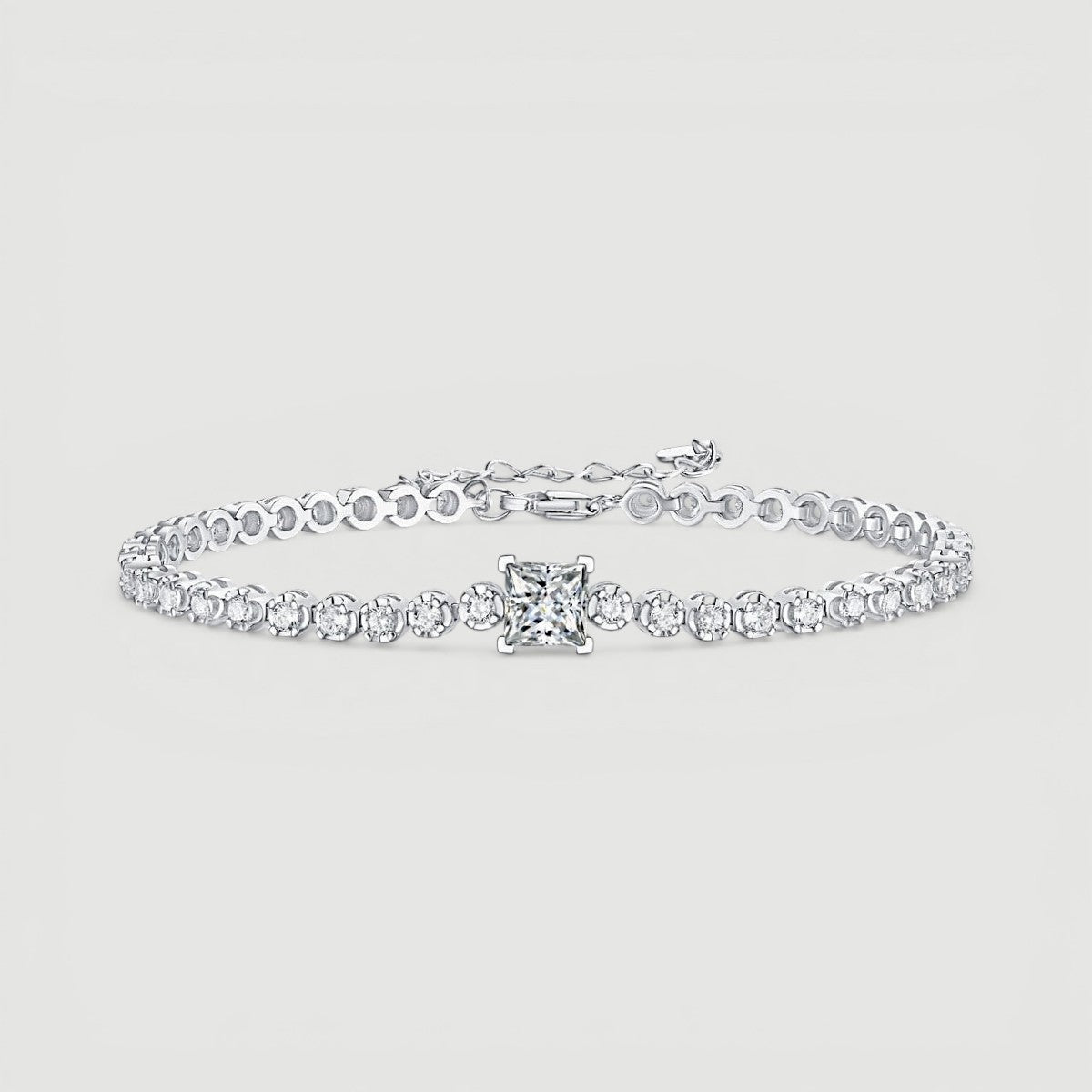 Amara Jewels 925 sterling silver tennis bracelet with princess-cut zirconia centerpiece and round-cut stones.