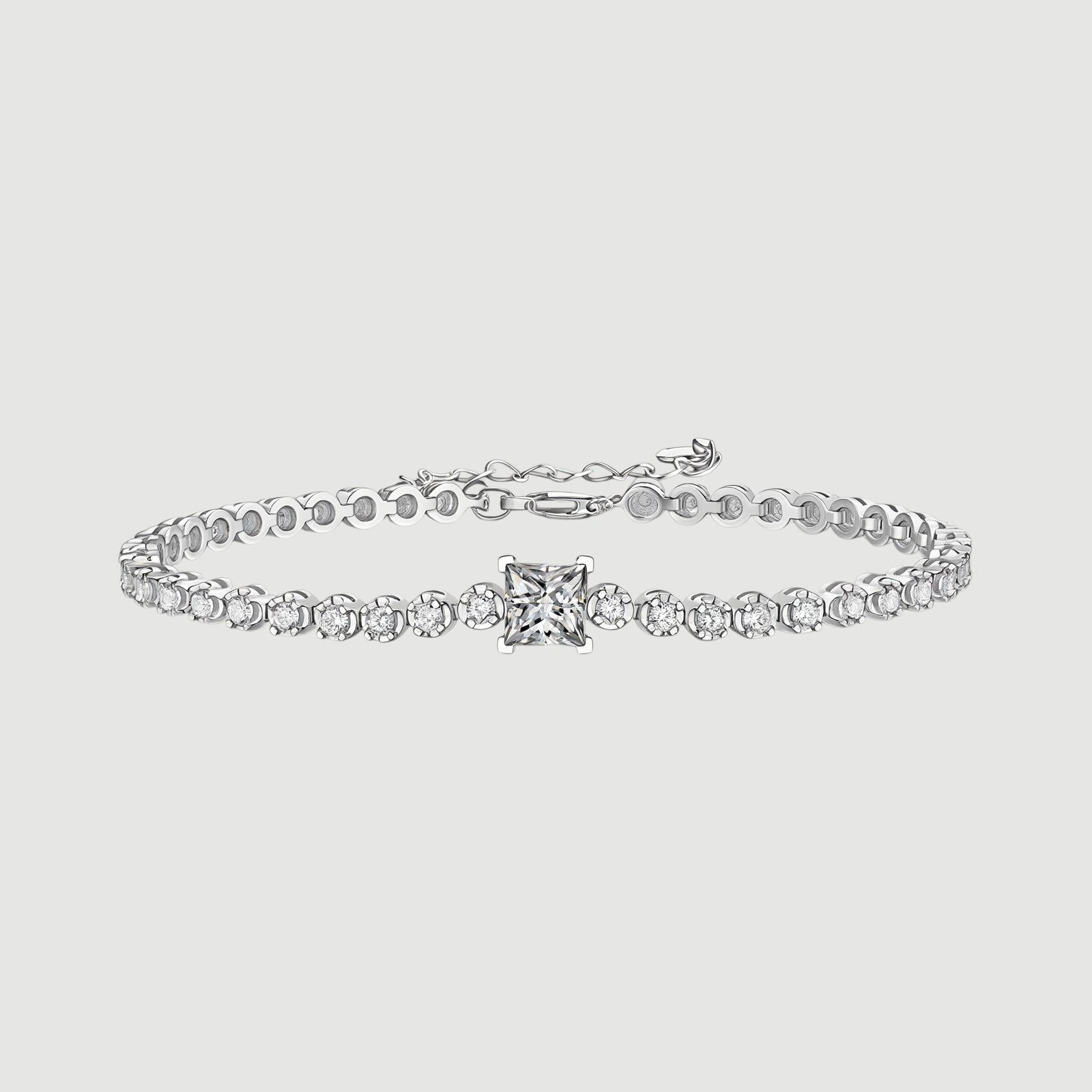 Amara Jewels 925 sterling silver tennis bracelet with princess-cut zirconia centerpiece and round-cut stones.