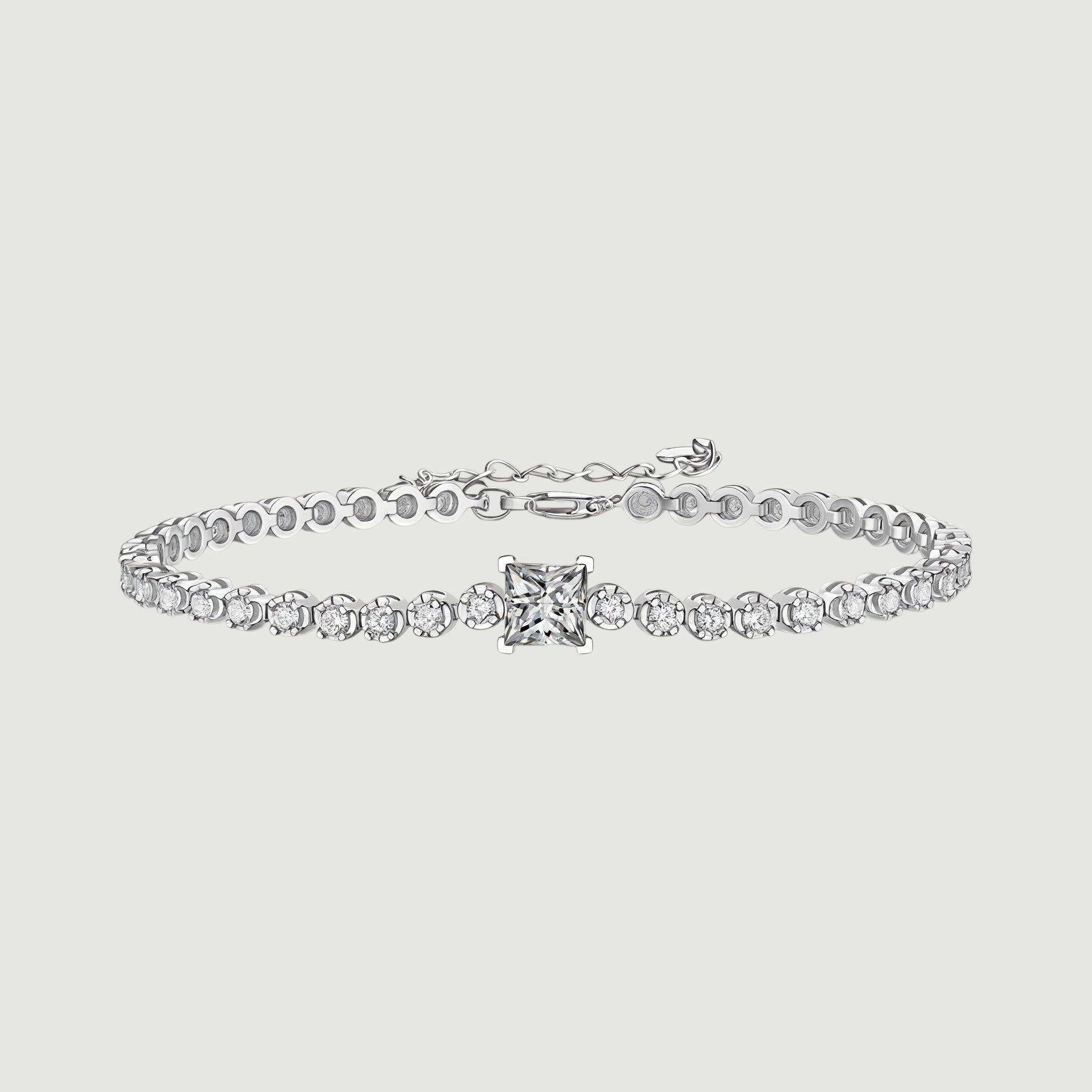 Amara Jewels 925 sterling silver tennis bracelet with princess-cut zirconia centerpiece and round-cut stones.