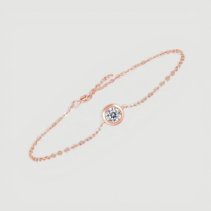 Amara Jewels rose gold vermeil 925 sterling silver bracelet with a sparkling bezel-set zircon stone.