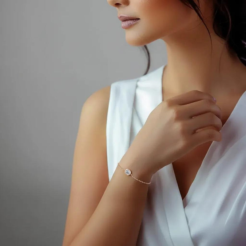 Amara Jewels rose gold vermeil 925 sterling silver bracelet with a sparkling bezel-set zircon stone.