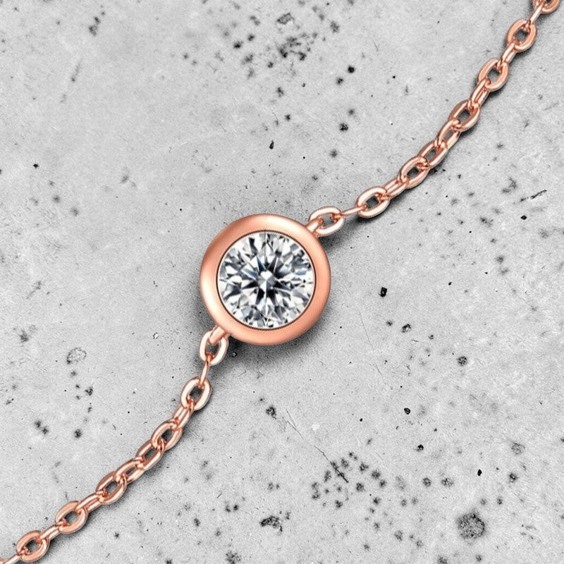 Amara Jewels rose gold vermeil 925 sterling silver bracelet with a sparkling bezel-set zircon stone.