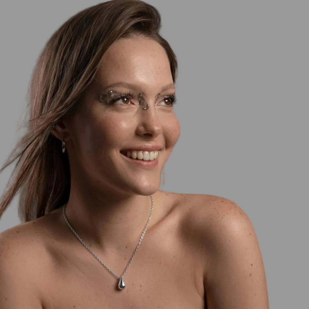 Amara Jewels sterling silver teardrop pendant necklace with a delicate chain.