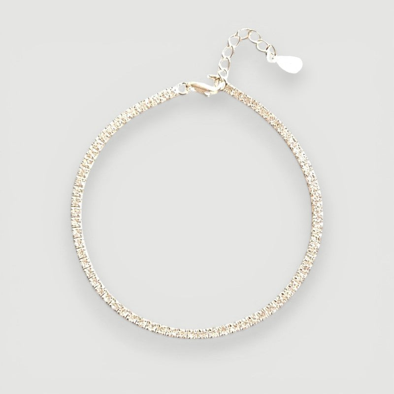 Amara Jewels classic tennis bracelet with white-plated sterling silver and sparkling stones, adjustable clasp.