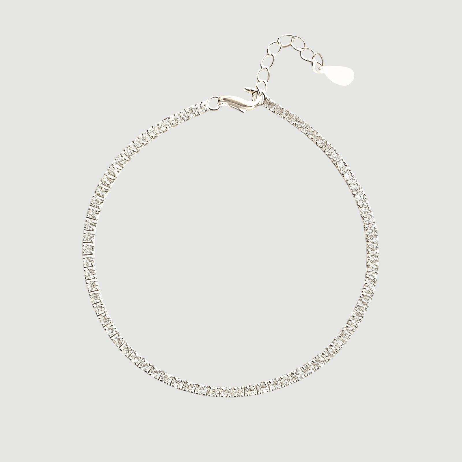 Amara Jewels classic tennis bracelet with white-plated sterling silver and sparkling stones, adjustable clasp.