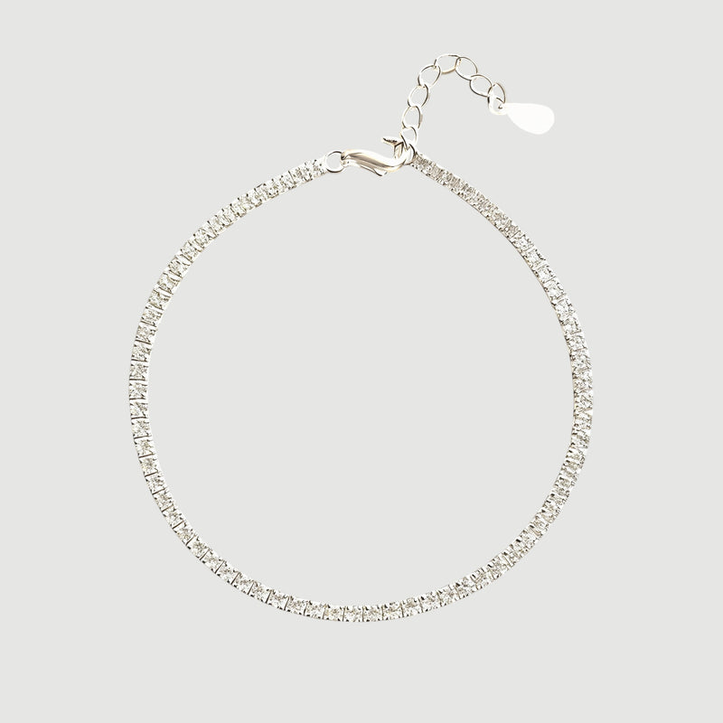 Amara Jewels classic tennis bracelet with white-plated sterling silver and sparkling stones, adjustable clasp.