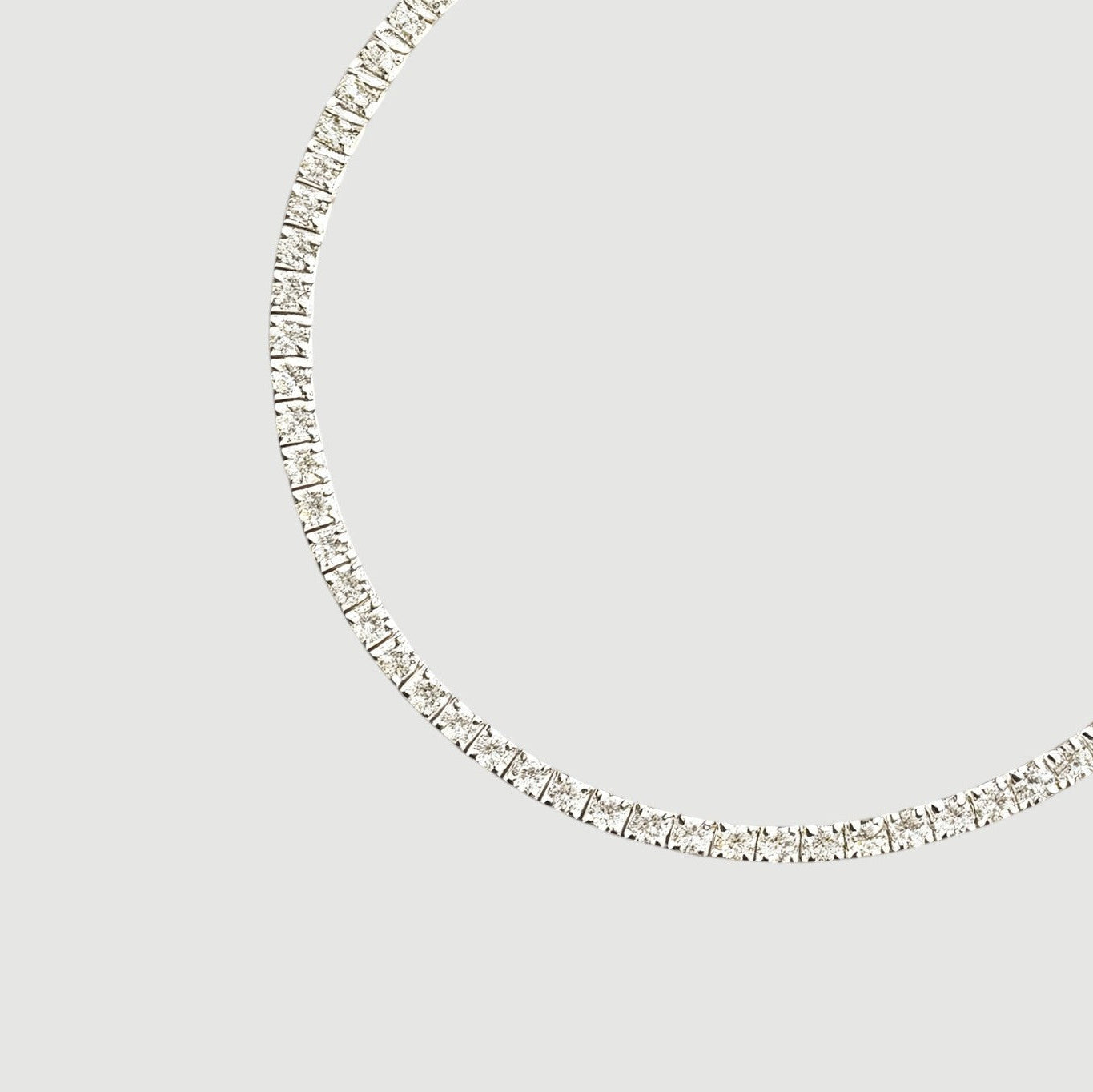 Amara Jewels classic tennis bracelet with white-plated sterling silver and sparkling stones, adjustable clasp.