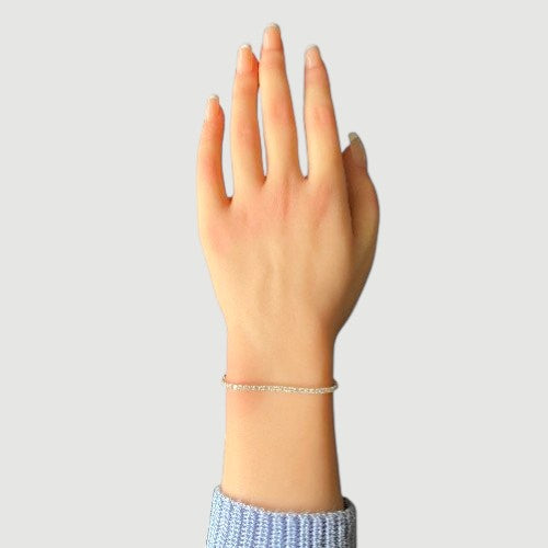 Amara Jewels classic tennis bracelet with white-plated sterling silver and sparkling stones, adjustable clasp.