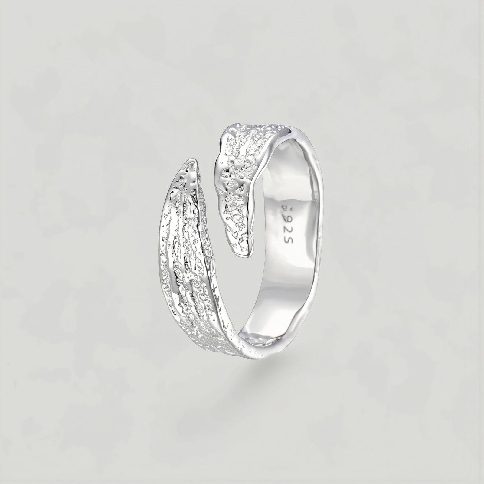 Amara Jewels textured sterling silver wrap ring with an open-ended design and artisanal feel.