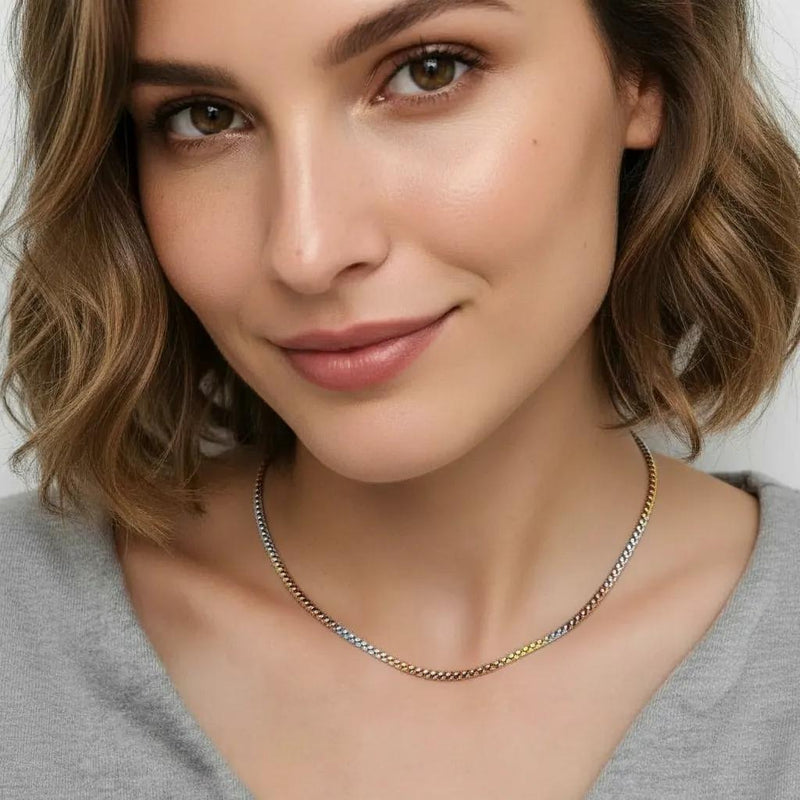 Amara Jewels Tricolor Italian chain necklace in sterling silver with diamond-cut texture, featuring silver, yellow gold, and rose gold tones.
