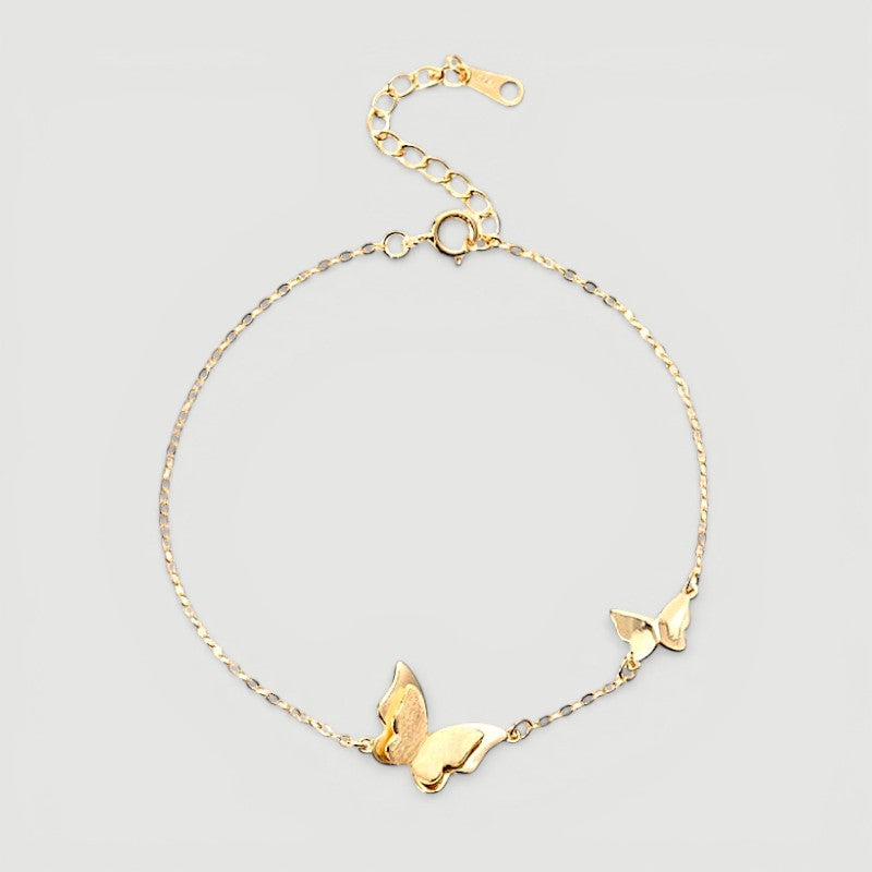 Amara Jewels delicate gold-plated 925 sterling silver bracelet with two butterfly charms and an adjustable chain.