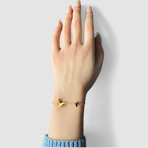 Amara Jewels delicate gold-plated 925 sterling silver bracelet with two butterfly charms and an adjustable chain.