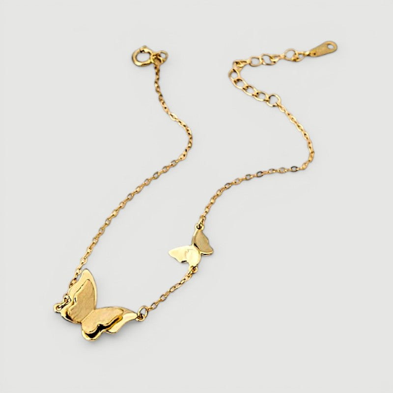 Amara Jewels delicate gold-plated 925 sterling silver bracelet with two butterfly charms and an adjustable chain.